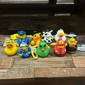 9 JA-RU miniature rubber duck keychains, police, pirate, fireman, mummy, etc NWT
